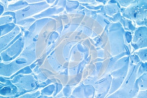 blue water wave abstract, natural ripple and bubble texture, gel soap, background photography