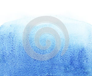 Blue watercolor abstract background with paper texture, blue paint with granulation