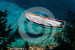 Blue waters of Foki Fiskardo Beach. Fiskardo, Kefalonia, Greece