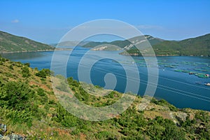 Blue waters of Koman Lake . Reservoir built on Drin River