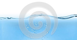 Blue wave water with bubbles in tank on white background, slow motion