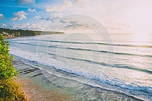 Blue waves for surfing at Bali and tropical beach. Ocean wave in Indonesia
