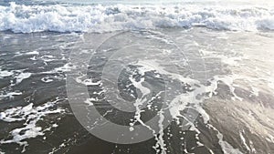 Blue waves surfing on ocean tropical beach