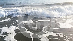 Blue waves surfing on ocean tropical beach