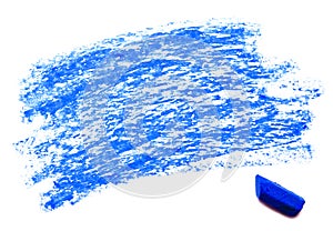 Blue wax crayon isolated on a white photo