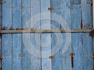 Blue weathered garage door