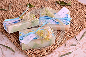 Blue wedding favors decoration handmade soaps with flowers and label with monogram letters