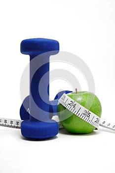 Blue Weights, Green Apple, and Tape Measure