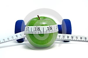 Blue Weights, Green Apple, and Tape Measure