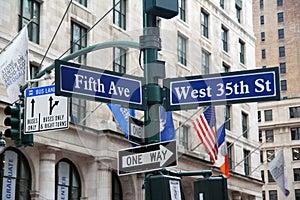 Blue West 35th Street and Fifth Avenue historic sign in midtown Manhattan