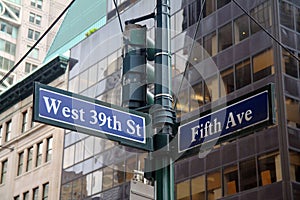 Blue West 39th Street and Fifth Avenue historic sign in midtown Manhattan