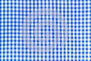 Blue and white abstract checkered fabric pattern, tablecloth gingham picnic texture background