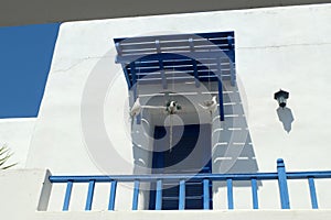 BLUE AND WHITE BALCONY AS MEDITERRANEAN STYLE IN SANTORINI PARK, THAILAND