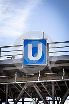 Blue and white Berlin subway sign