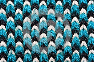 Blue, white and black pattern of synthetic knitted fabric texture