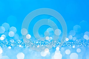 Blue and white bokeh,circle abstract light background,Blue shining lights,sparkling glittering Christmas lights.Blurred abstract e photo