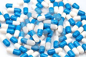 Blue and white capsules