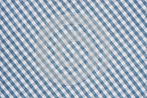 Blue and white checkered fabric background texture