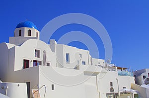 Blue and white colours of Oia City. Magnificent panorama of the island of Santorini Greece during a beautiful sunset in the Medite