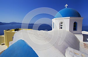 Blue and white colours of Oia City. Magnificent panorama of the island of Santorini Greece during a beautiful sunset in the Medite