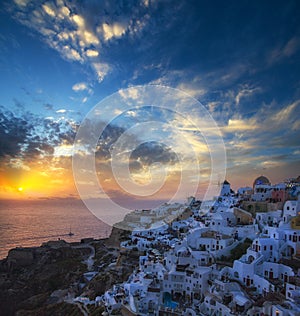 Blue and white colours of Oia City. Magnificent panorama of the island of Santorini Greece during a beautiful sunset in the Medite