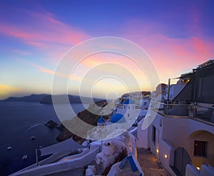 Blue and white colours of Oia City. Magnificent panorama of the island of Santorini Greece during a beautiful sunset in the Medite