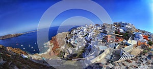 Blue and white colours of Oia City. Magnificent panorama of the island of Santorini Greece during a beautiful sunset in the Medite