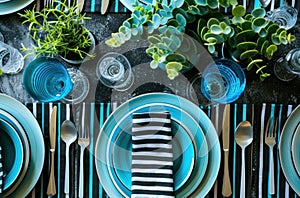 blue and white dinner table setting with plate and plants