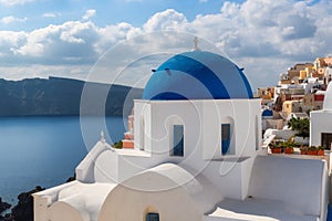 Blue and white domed churches on Santorini Greek Island photo