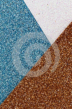 Blue, white and Gold glitter texture abstract background. Shape of the triangle