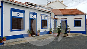 Blue and white houses in Vila Nova de Milfontes portugal