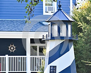 Blue and White Lighthouse with stripes