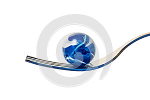 A Blue and White Marble On A Fork