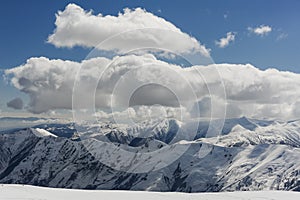 Blue and white mountains in the snow