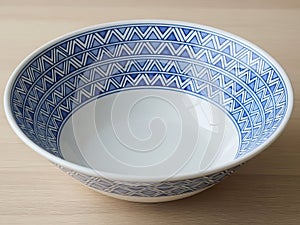 Blue and white patterned ceramic bowl