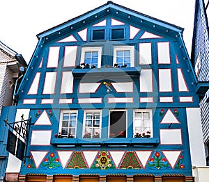 Blue and white picturesque German half-timbered house