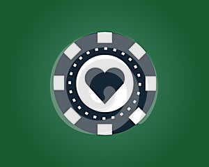 Blue white poker chip on a green background