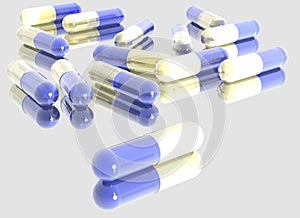 blue-white reflective pills on glass support