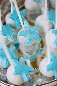 Blue and white star candy on sticks, marine thematic candy bar