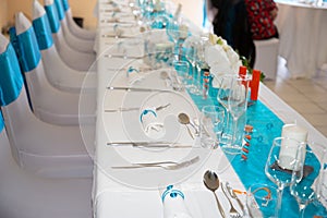 Blue and white table set up for wedding reception