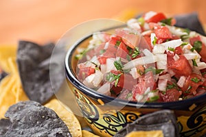 Blue and White Tortilla chips with Salsa in an Ethnic bowl