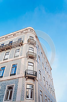 Blue and white traditional tiled building in Lisbon, Portugal