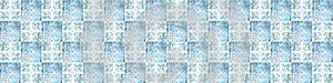 Blue white vintage worn retro geometric motif cement square mosaic tiles wallpaper with flower leaves print texture background