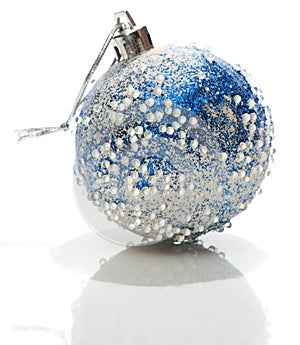 Blue and white Xmas ball with transparent drops on