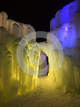 Blue, white, and yellow colored lighted icicles