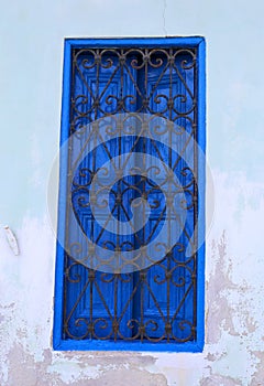 Blue Window with iron bars