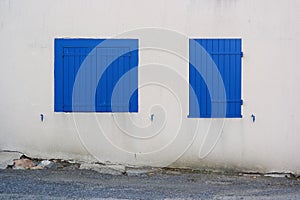 Blue window shutters