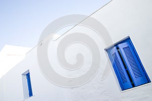 Blue windows details at Serifos island, Greece