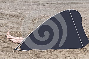 Blue windshield standing on the beach