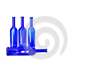 Blue wine bottles still life with colourful background